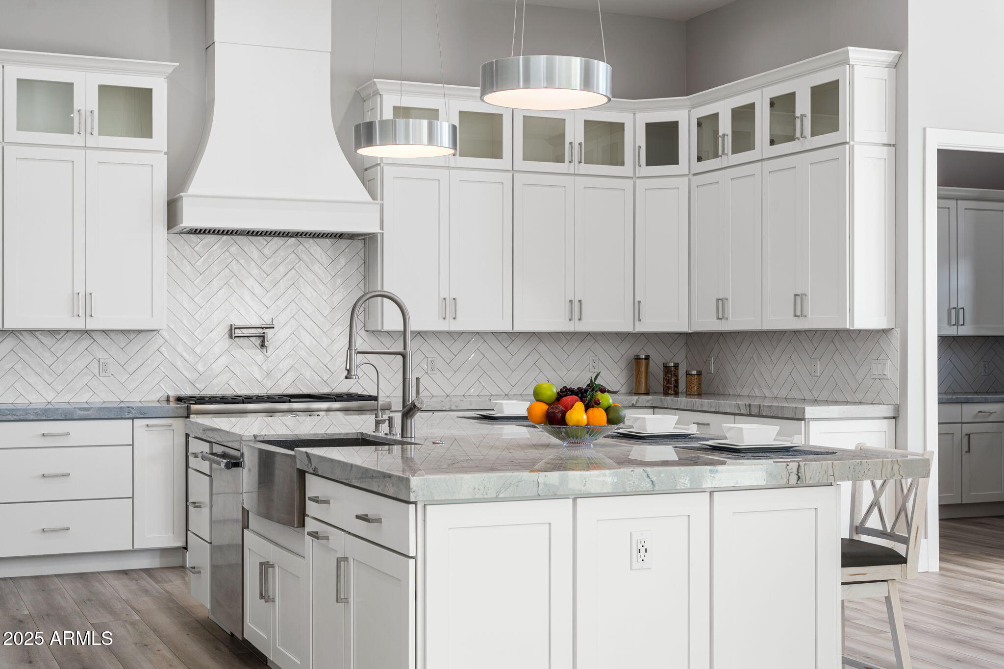 24614 South 183rd Street Gilbert, AZ 85298 - Photo 8 of 45 a kitchen with stainless steel appliances granite countertop a sink stove and cabinets