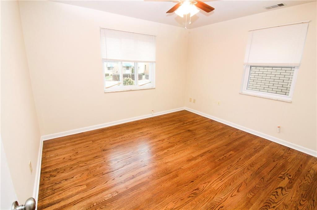 558 Hillcrest Avenue McKees Rocks, PA 15136 - Photo 13 of 25 Hardwoods continue to stun in both main floor bedrooms