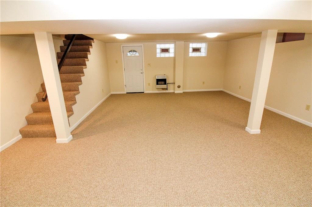 558 Hillcrest Avenue McKees Rocks, PA 15136 - Photo 17 of 25 Tons of space for entertainment in the finished basement!