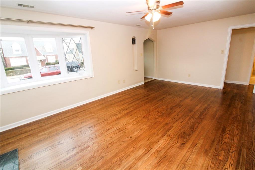 558 Hillcrest Avenue McKees Rocks, PA 15136 - Photo 4 of 25 Light and Bright living room with bay window!