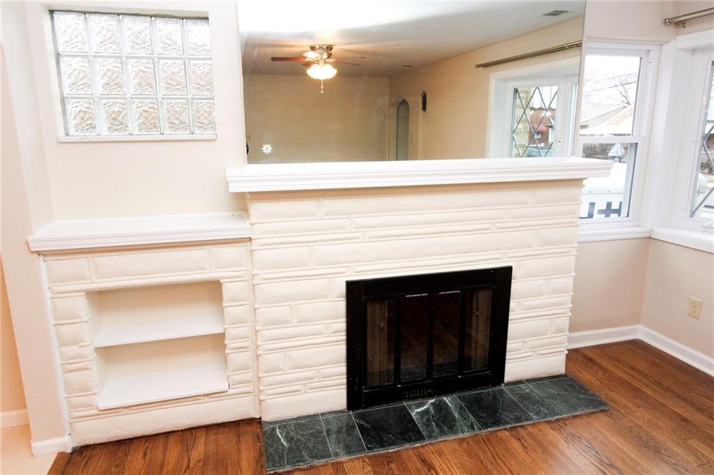 558 Hillcrest Avenue McKees Rocks, PA 15136 - Photo 5 of 25 Decorative Fireplace adds even more character!