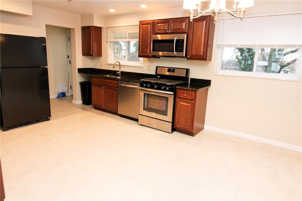 558 Hillcrest Avenue McKees Rocks, PA 15136 - Photo 8 of 25 Open kitchen and dining area