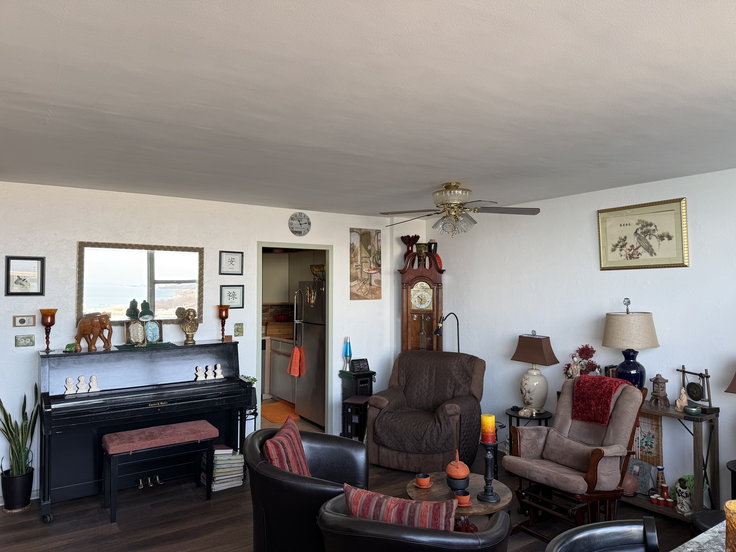 6301 North Sheridan Road, Unit 24C Chicago, IL 60660 - Photo 10 of 27 a living room with furniture and a fireplace
