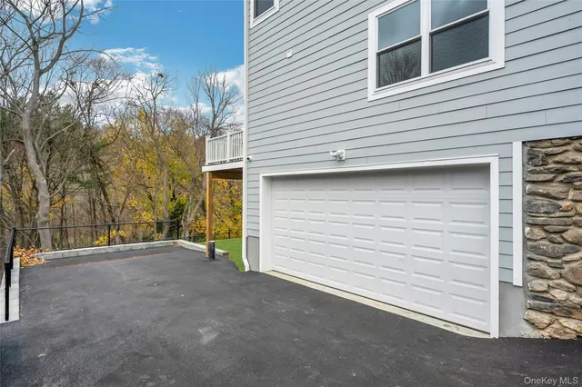 a view of a house with a garage