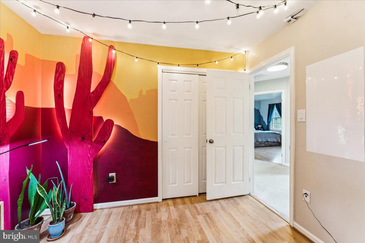 12592 Rock Ridge Road Herndon, VA 20170 - Photo 25 of 41 a view of a room with wooden floor and a shower