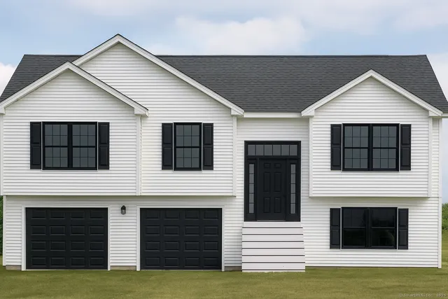a view of a house with a small yard