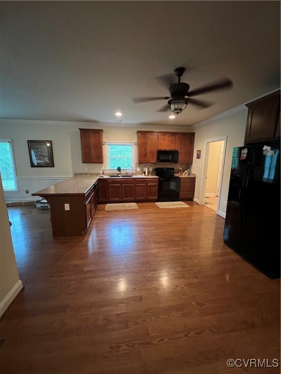 132 Forest View Road Cumberland, VA 23040 - Photo 16 of 31 Kitchen with kitchen peninsula, refrigerator, orna