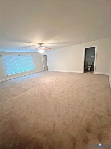 wooden floor in an empty room with a gallery