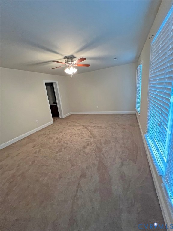 132 Forest View Road Cumberland, VA 23040 - Photo 29 of 31 Unfurnished bedroom featuring a ceiling fan, carpe