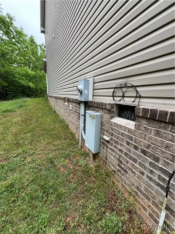 a view of a chairs and a table in the patio