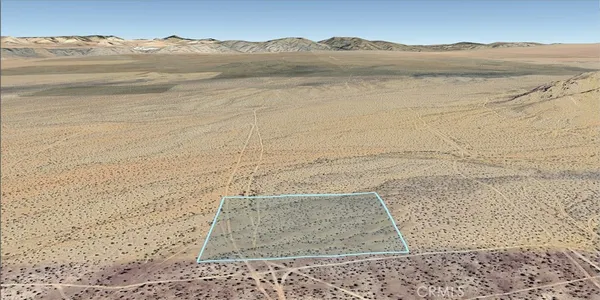 a view of an ocean and a mountain