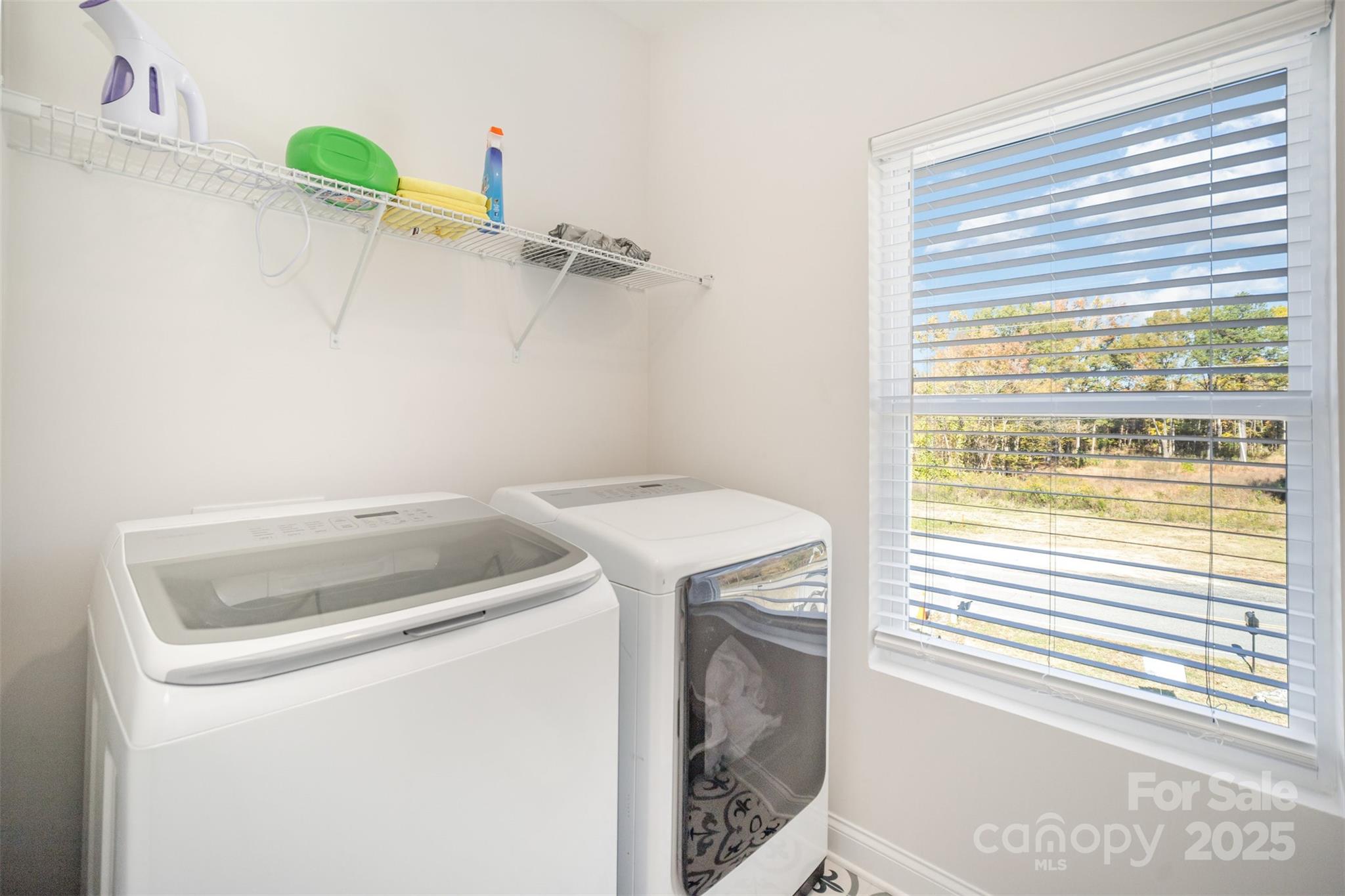 320 Lawrence Gray Road Charlotte, NC 28262 - Photo 17 of 23 a utility room with dryer and washer