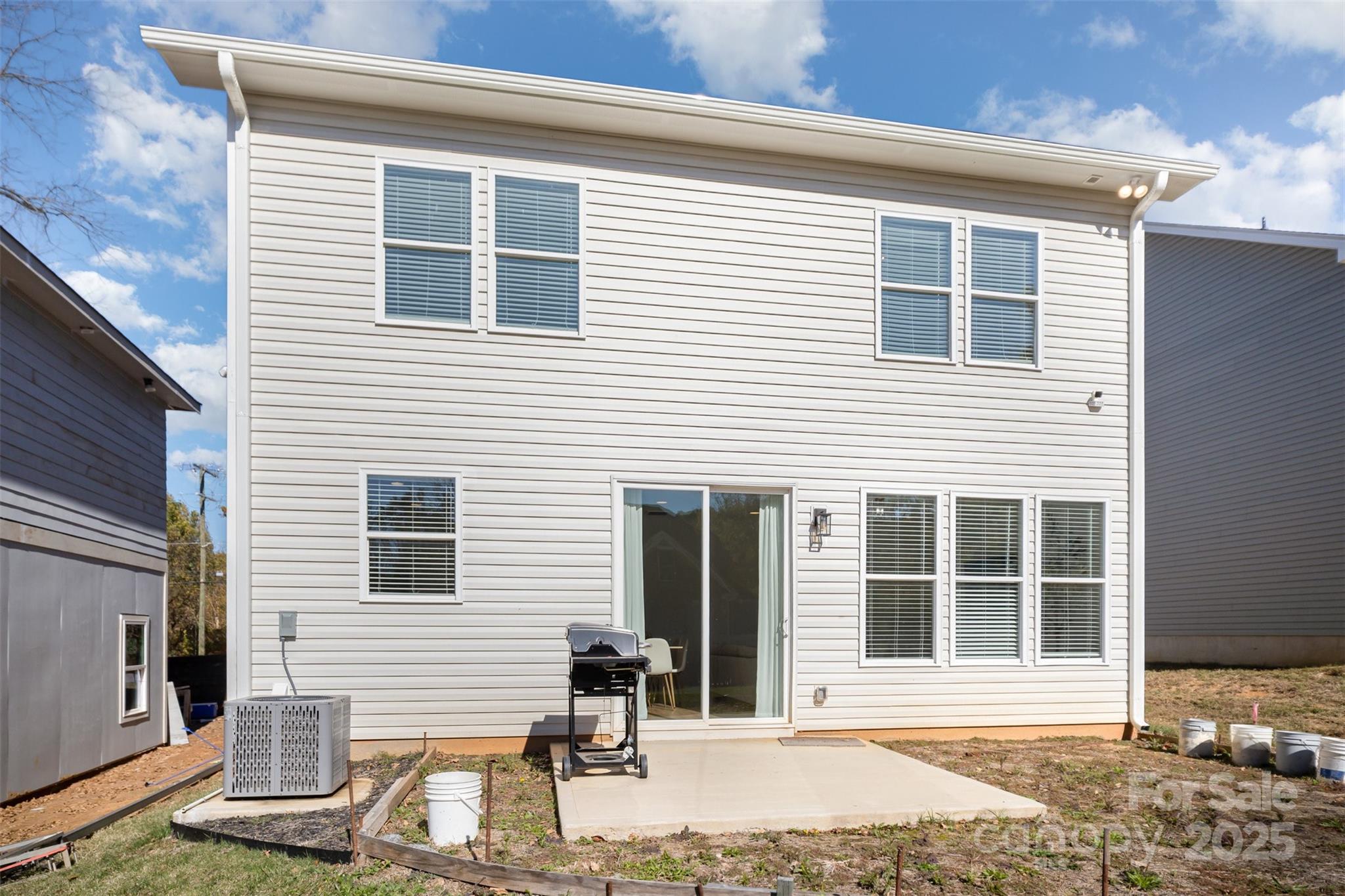 320 Lawrence Gray Road Charlotte, NC 28262 - Photo 22 of 23 a front view of a house with a patio