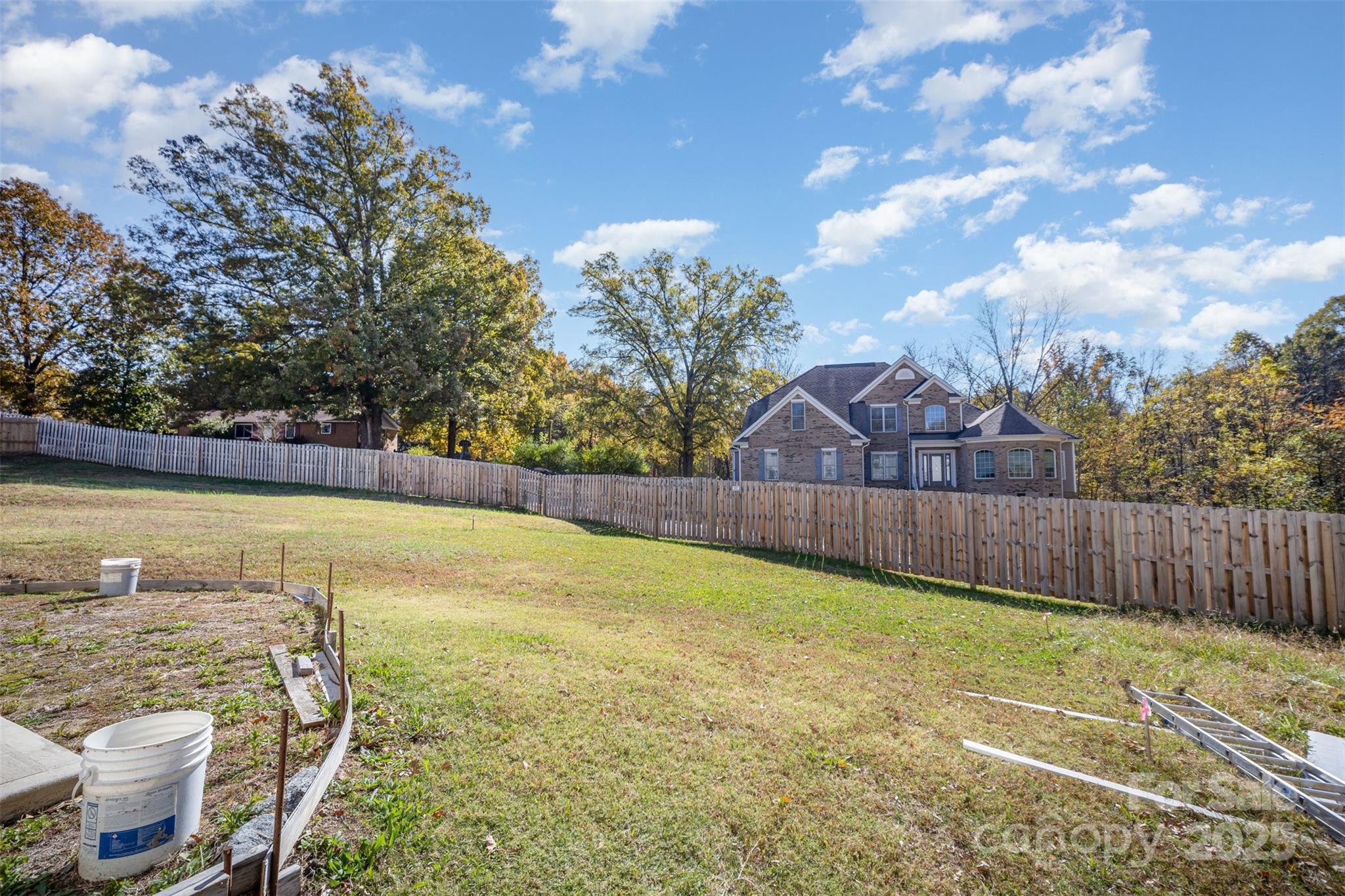 320 Lawrence Gray Road Charlotte, NC 28262 - Photo 23 of 23 a view of a swimming pool with a yard