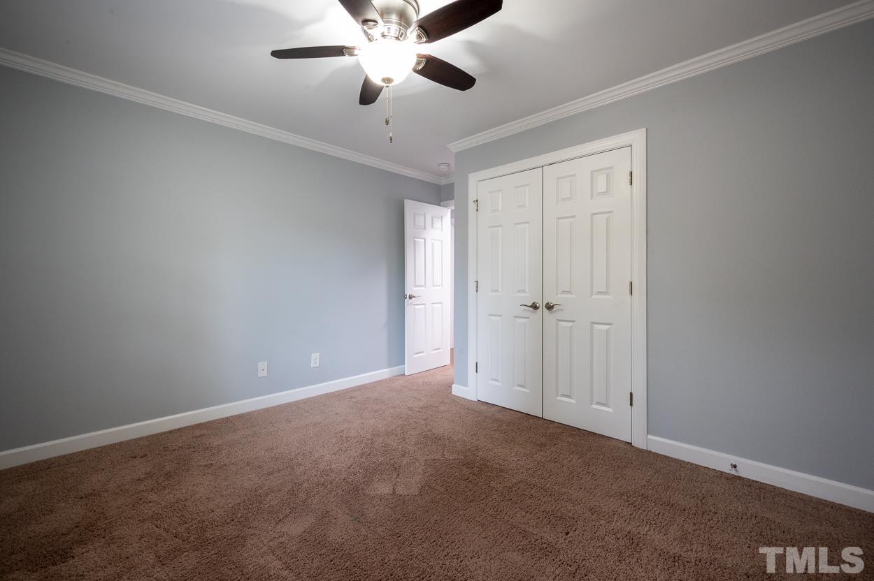 3400 Morningside Drive Raleigh, NC 27607 - Photo 15 of 21 an empty room with windows and fan