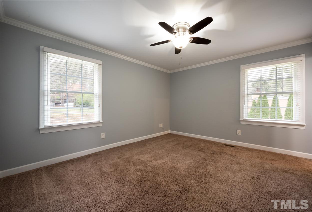 3400 Morningside Drive Raleigh, NC 27607 - Photo 18 of 21 a view of room with a ceiling fan and window