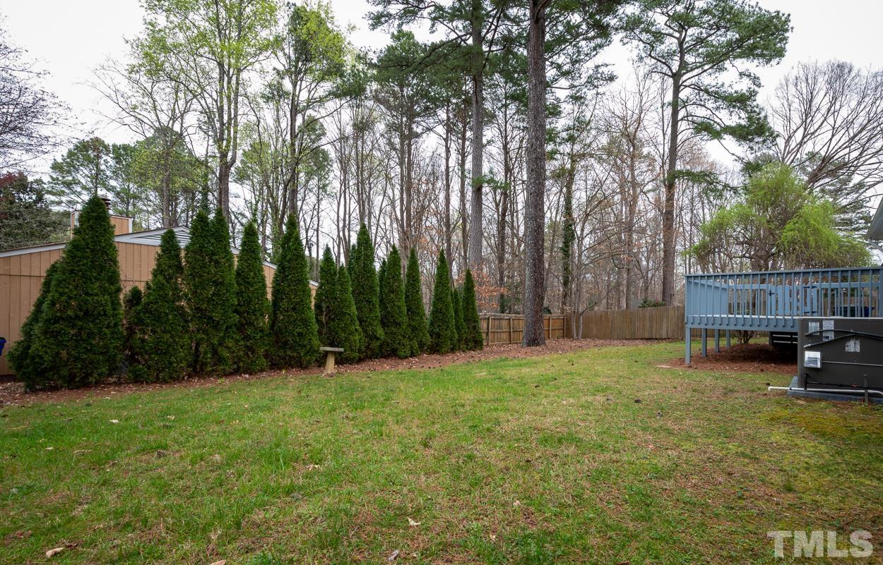 3400 Morningside Drive Raleigh, NC 27607 - Photo 4 of 21 a view of a backyard with trees