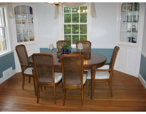 33 Barrows Road Reading, MA 01867 - Photo 3 of 11 a view of a dining room with furniture window and outside view