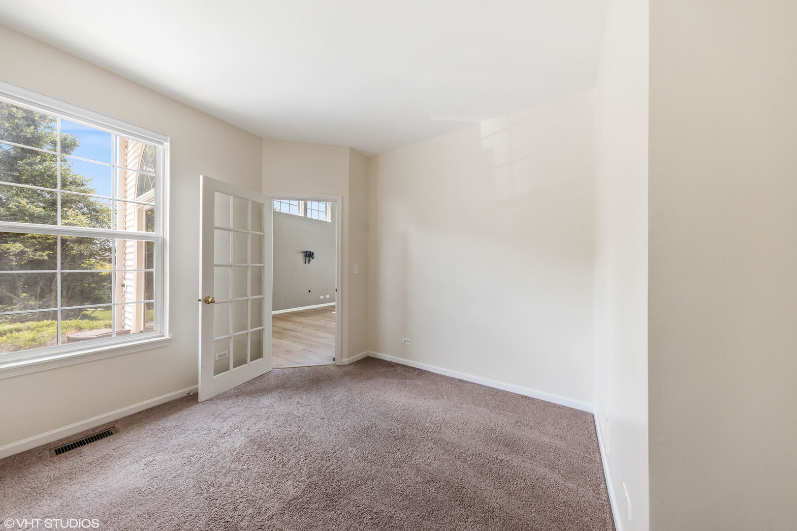 7 Edgebrook Court Algonquin, IL 60102 - Photo 4 of 18 a view of an empty room with a window