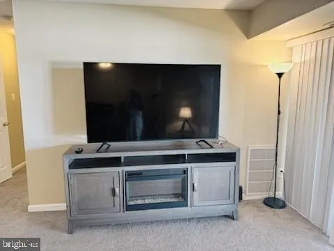 a kitchen with a stove and a microwave