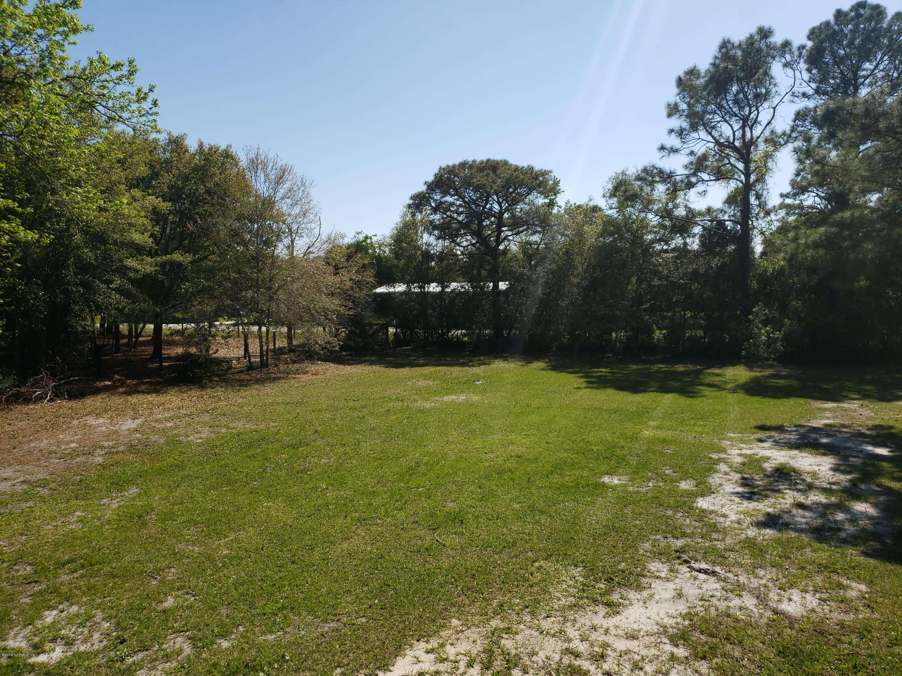 325 Dusty Road St. Augustine, FL 32095 - Photo 1 of 11 a view of a outdoor space