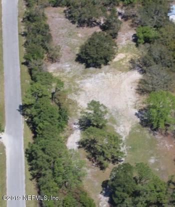 325 Dusty Road St. Augustine, FL 32095 - Photo 11 of 11 a view of a yard with plants and a yard