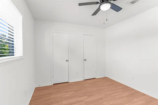 a view of a room that has a window in it