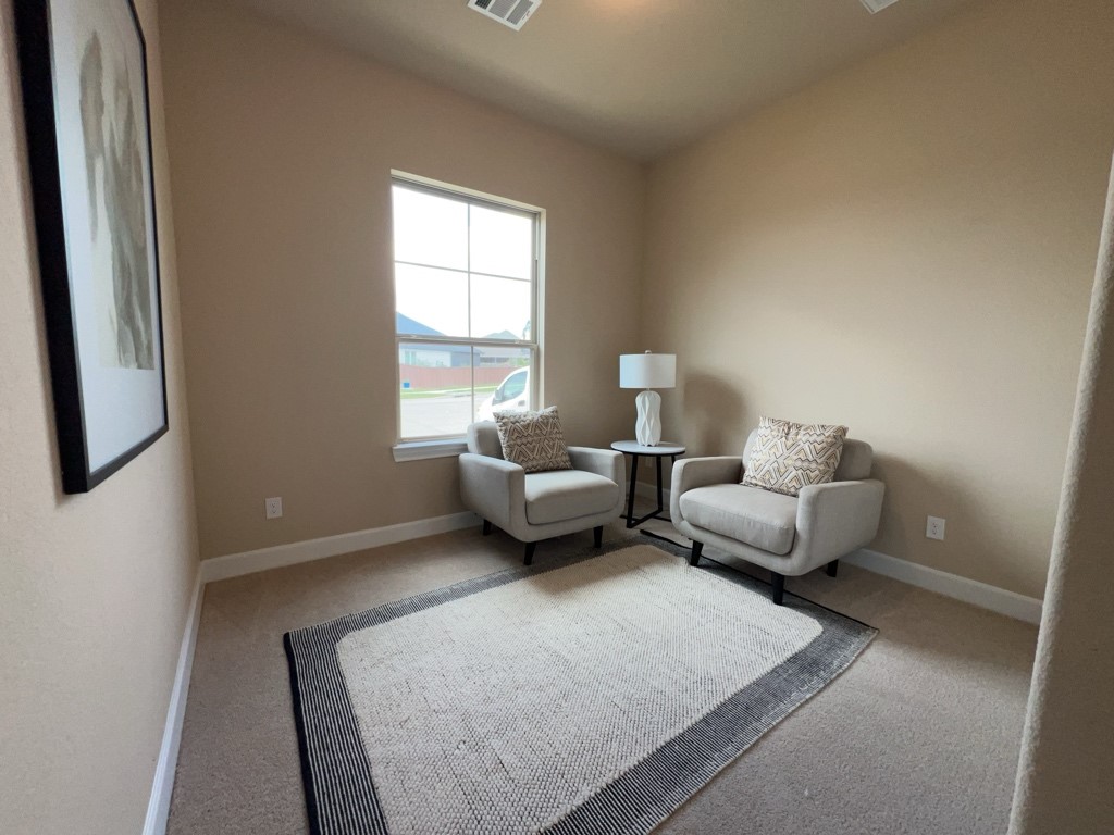 5602 Caracara Street Manvel, TX 77578 - Photo 20 of 27 a living room with furniture and a window