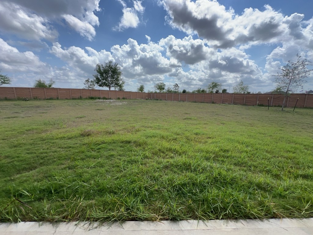 5602 Caracara Street Manvel, TX 77578 - Photo 23 of 27 a view of an ocean and beach
