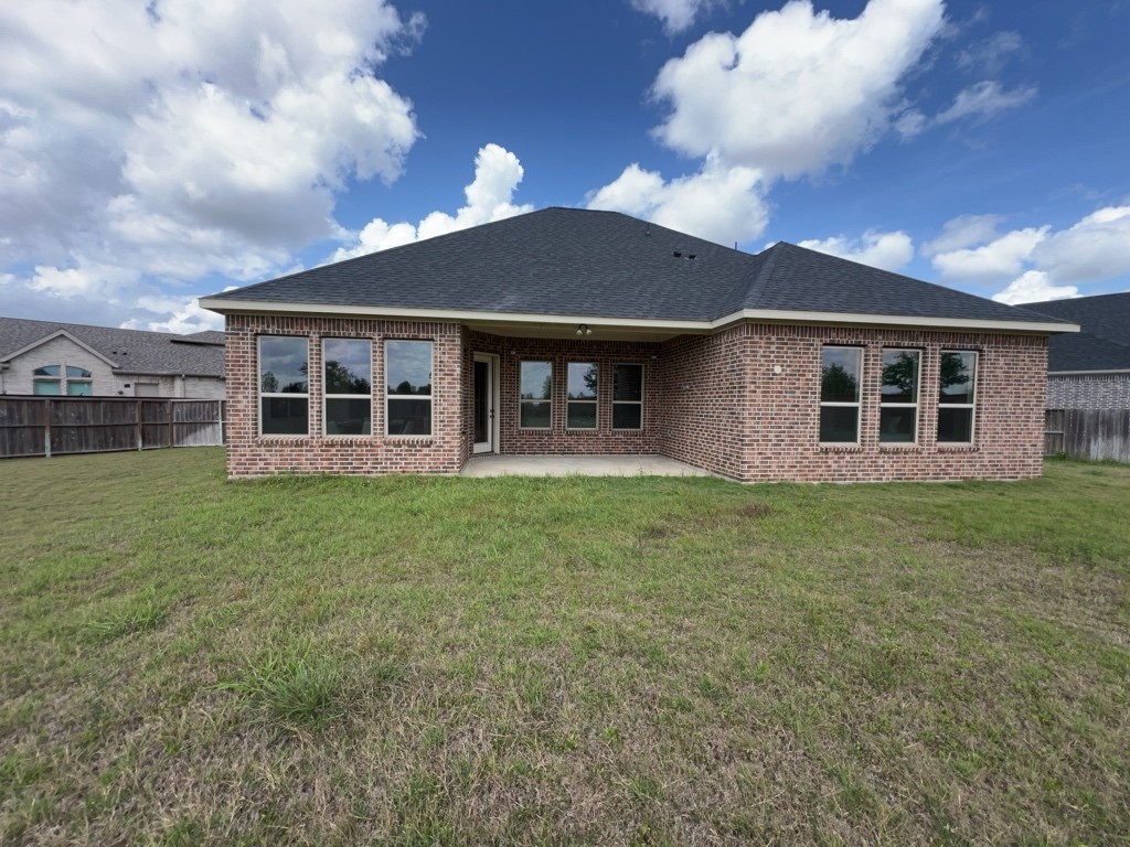5602 Caracara Street Manvel, TX 77578 - Photo 24 of 27 a house view with a garden space