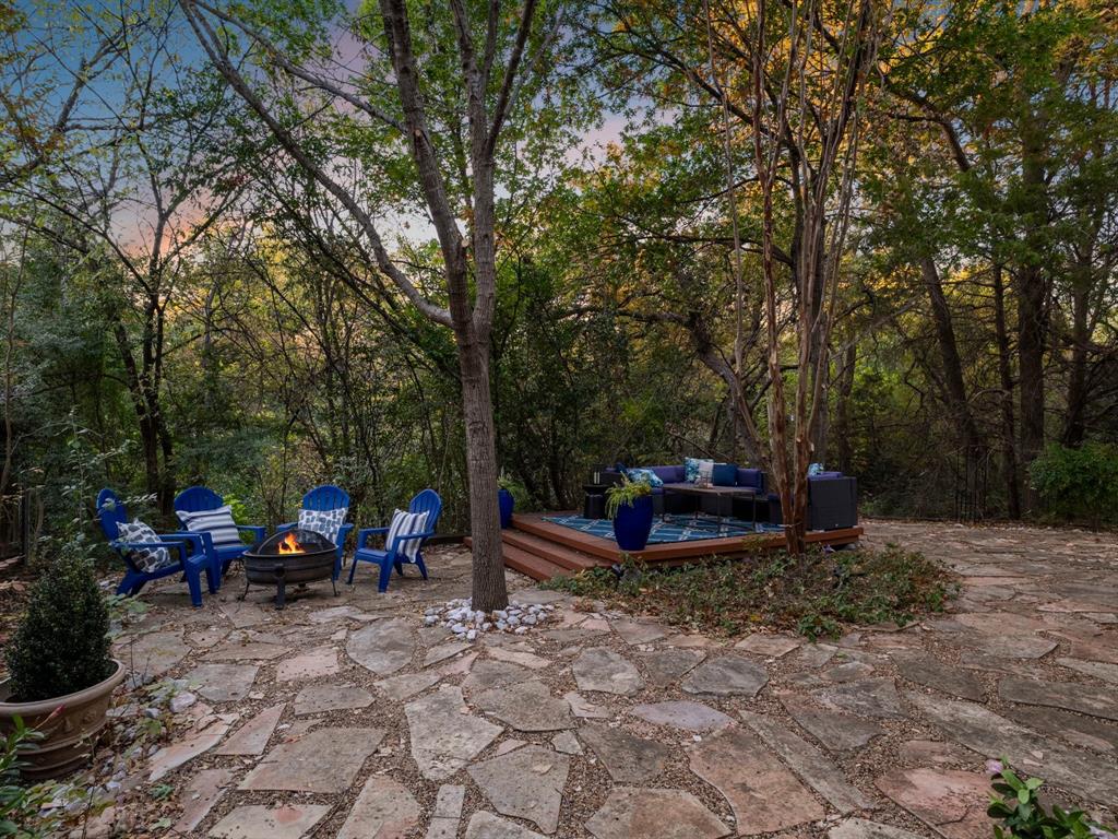 13347 Pandora Circle Dallas, TX 75238 - Photo 2 of 36 a view of a backyard with sitting area