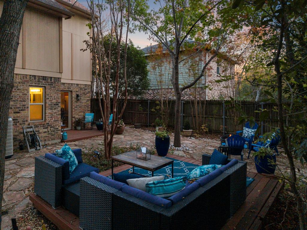 13347 Pandora Circle Dallas, TX 75238 - Photo 30 of 36 a view of house with backyard and outdoor seating