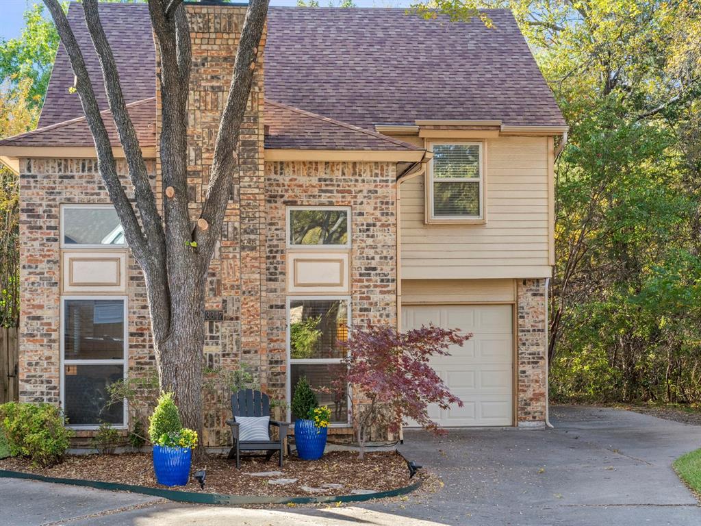 13347 Pandora Circle Dallas, TX 75238 - Photo 3 of 36 a front view of a house with plants
