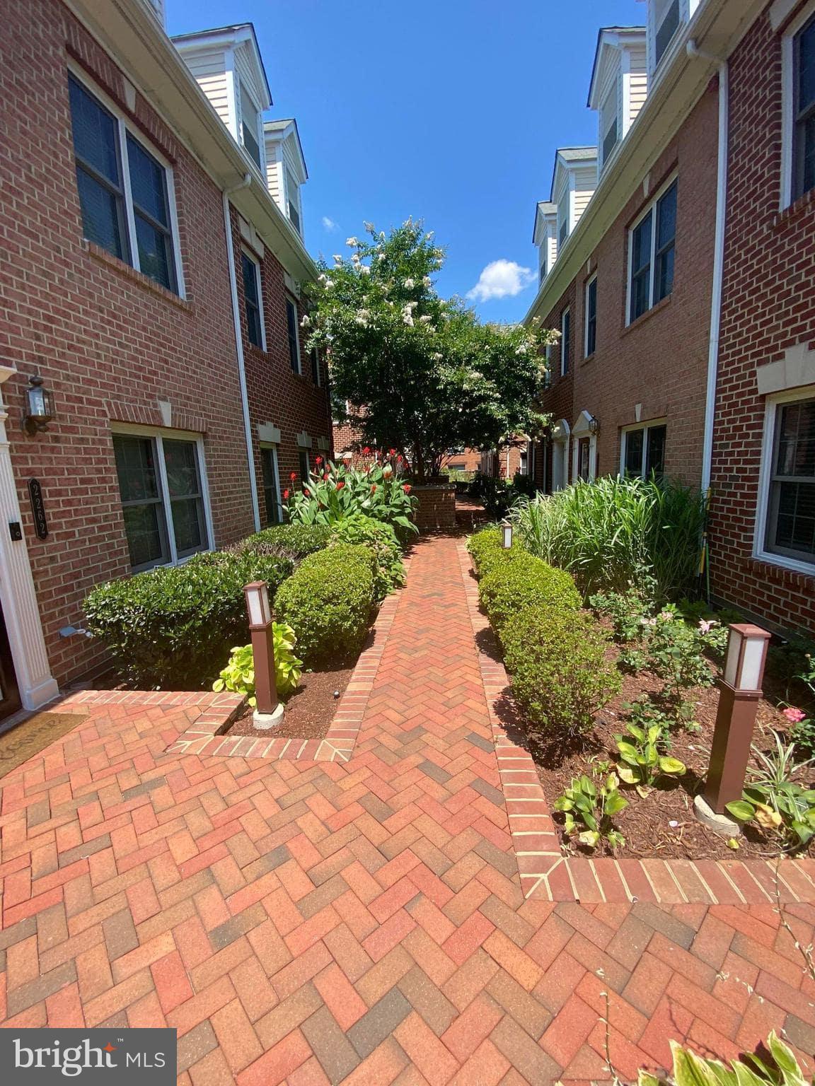 2256 South Garfield Street, Unit 11 Arlington, VA 22206 - Photo 13 of 21 a view of a pathway with a house