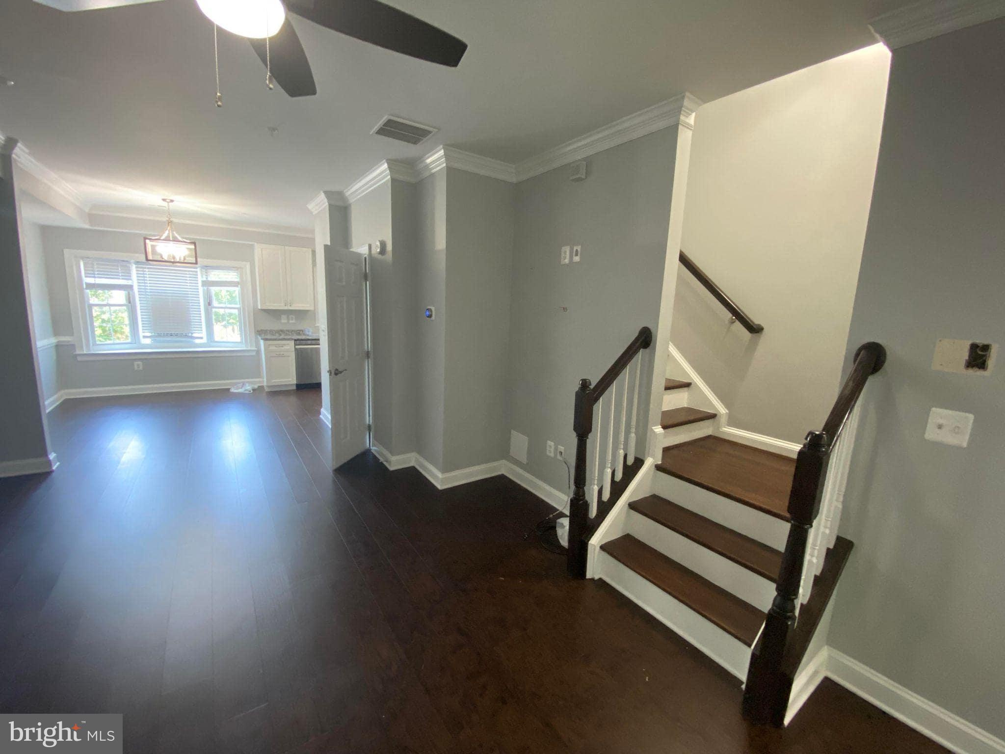 2256 South Garfield Street, Unit 11 Arlington, VA 22206 - Photo 14 of 21 a view of entryway with stairs and wooden floor