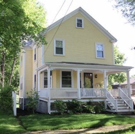 6 Newbury Street Beverly, MA 01915 - Photo 1 of 13 a front view of a house with a yard and potted plants