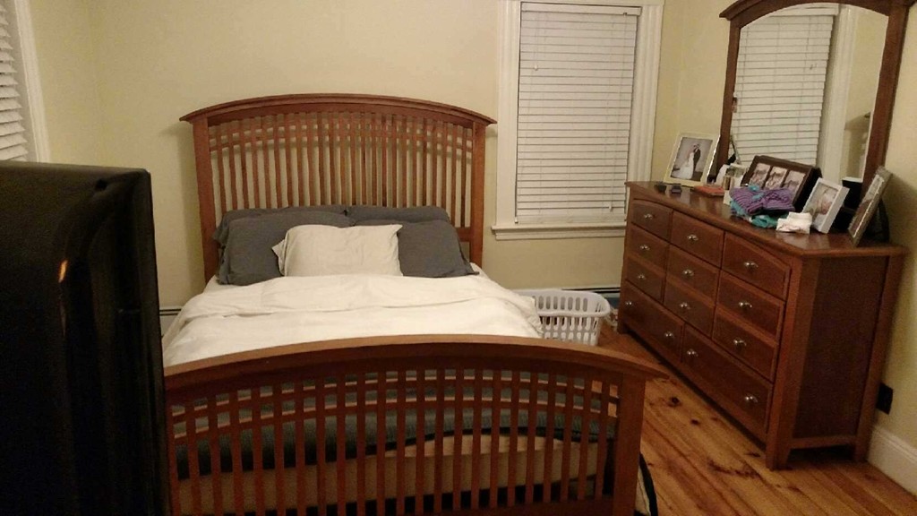 6 Newbury Street Beverly, MA 01915 - Photo 6 of 13 a bedroom with a bed and wooden floor