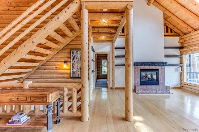 a view of a porch with wooden floor