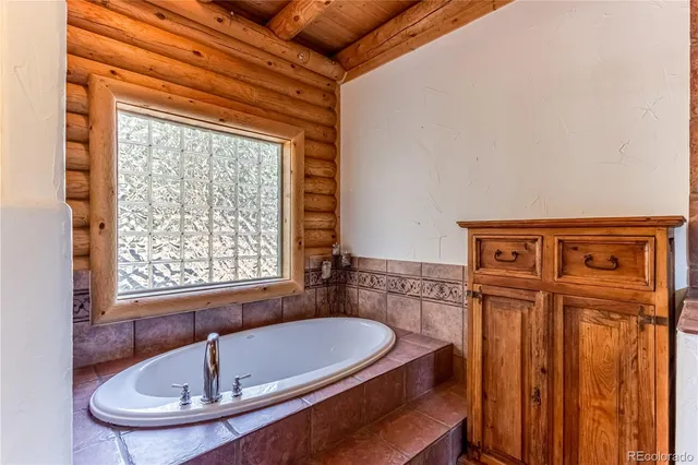 a view of a balcony with furniture