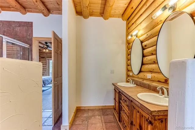 a view of an empty room with glass door