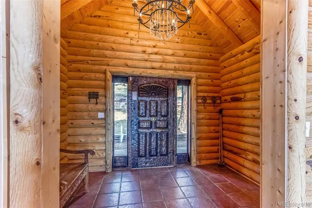 a view of wooden door and outdoor space