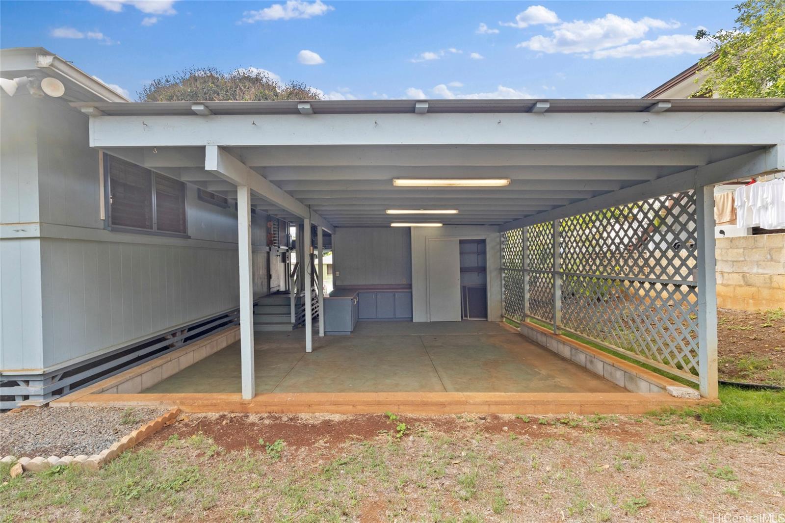 94-341 Kahuanani Street Waipahu, HI 96797 - Photo 16 of 24 a view of an empty room with a window