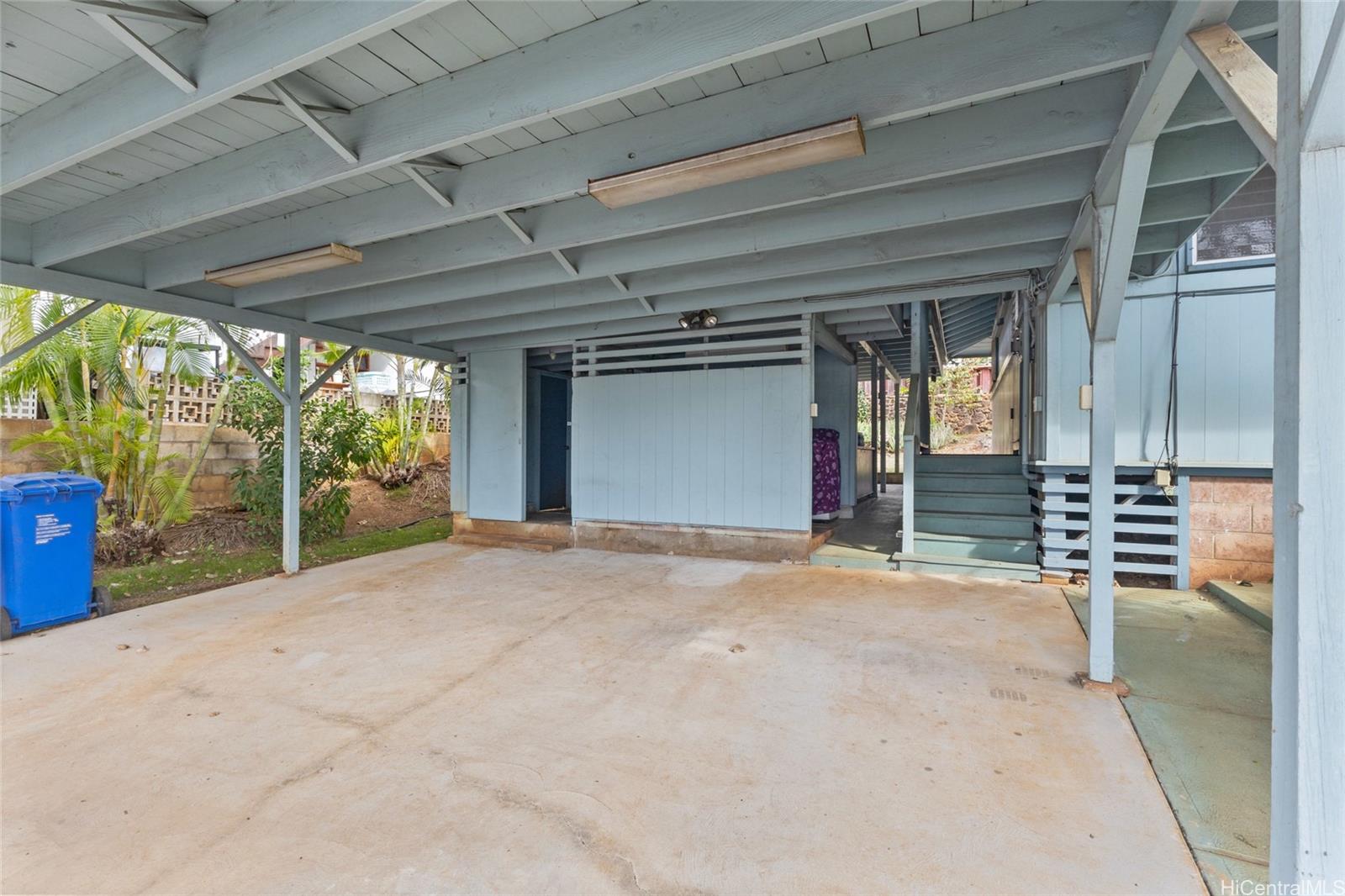 94-341 Kahuanani Street Waipahu, HI 96797 - Photo 18 of 24 a view of a house with porch and outdoor space