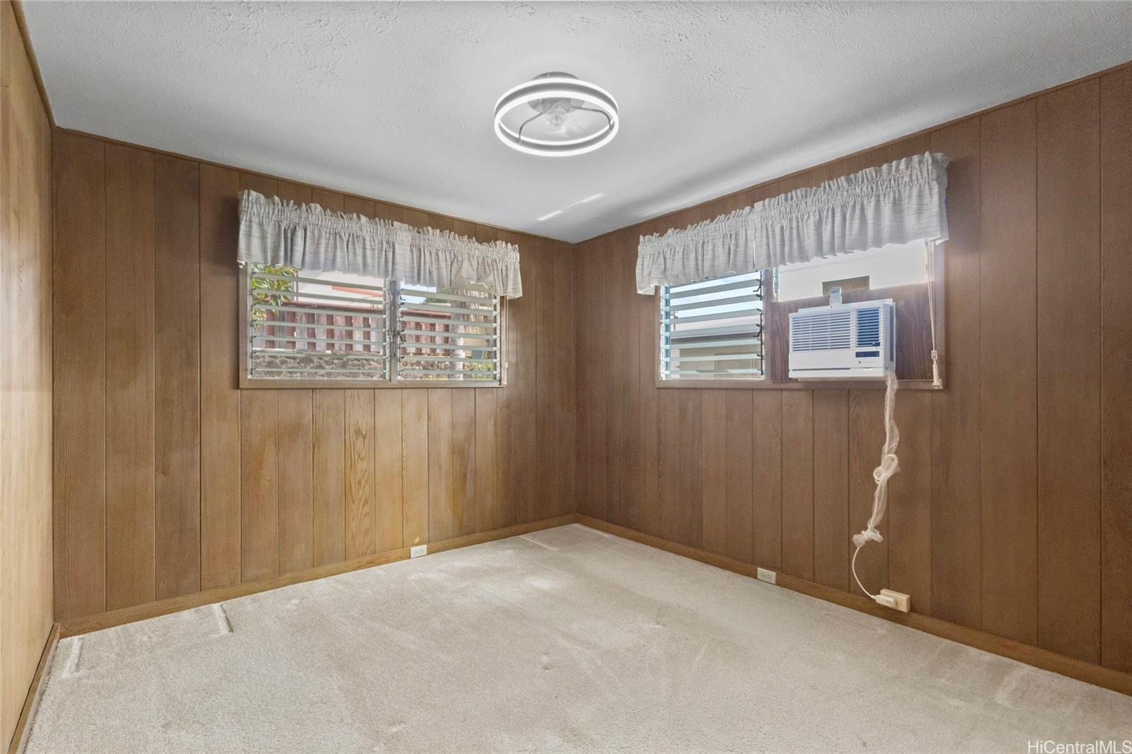 94-341 Kahuanani Street Waipahu, HI 96797 - Photo 19 of 24 an empty room with windows