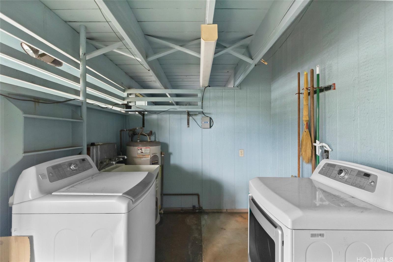 94-341 Kahuanani Street Waipahu, HI 96797 - Photo 21 of 24 a utility room with dryer and washer