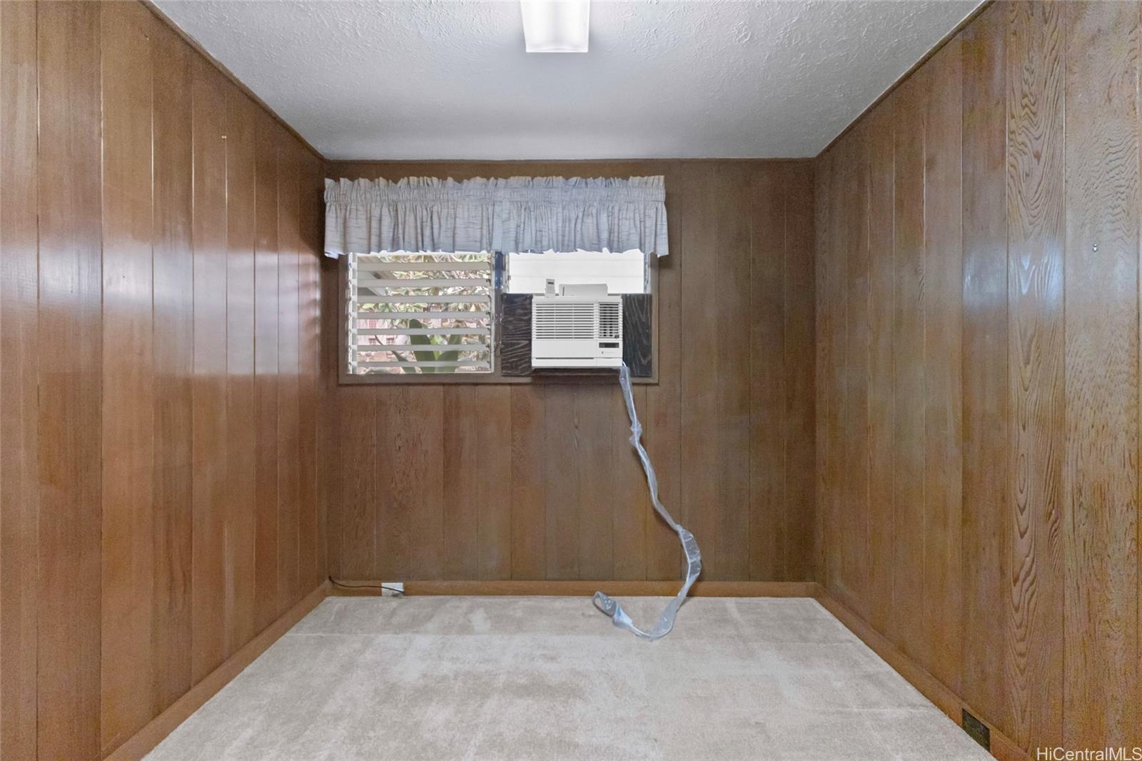 94-341 Kahuanani Street Waipahu, HI 96797 - Photo 10 of 24 a view of an empty room with a window