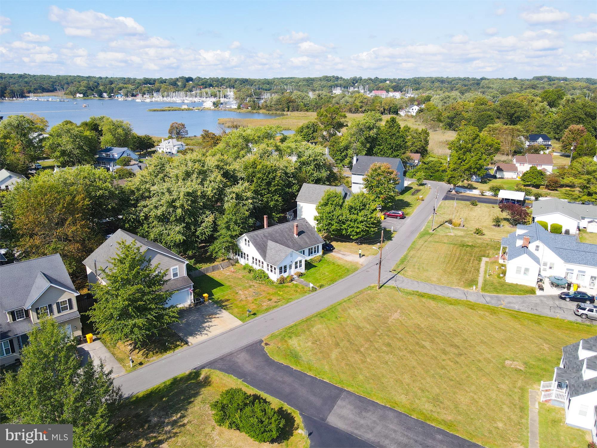 611 Clark Avenue Deale, MD 20751 - Photo 1 of 37 an aerial view of residential houses with outdoor space and swimming pool