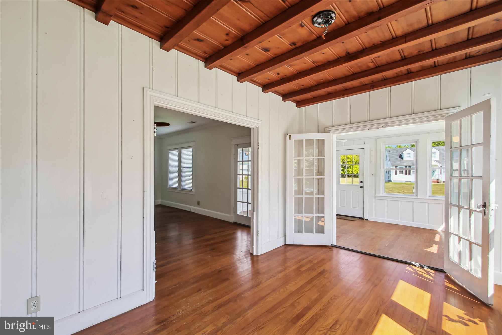 611 Clark Avenue Deale, MD 20751 - Photo 19 of 37 a view of an empty room with wooden floor and a window