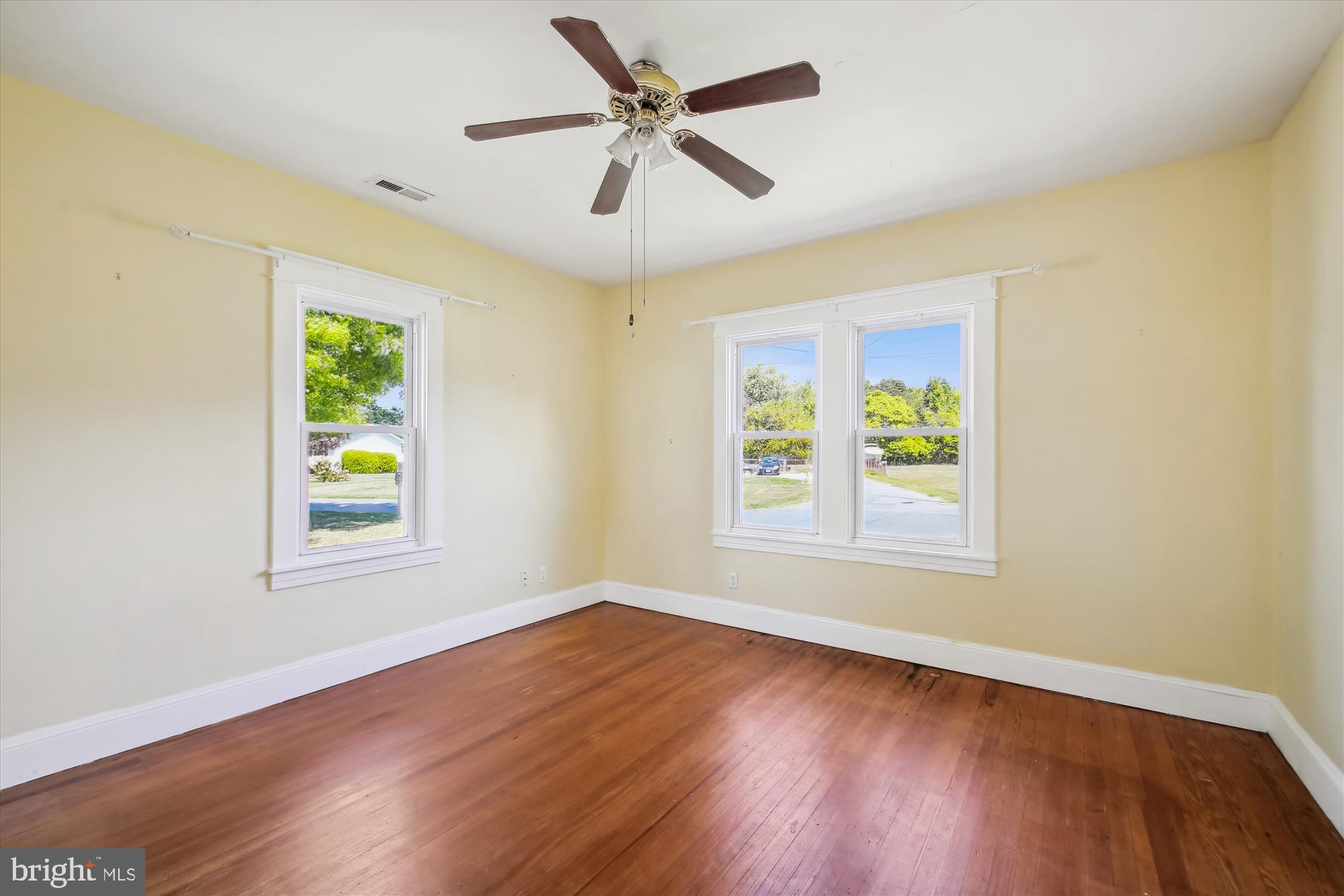 611 Clark Avenue Deale, MD 20751 - Photo 23 of 37 a view of an empty room with window and wooden floor