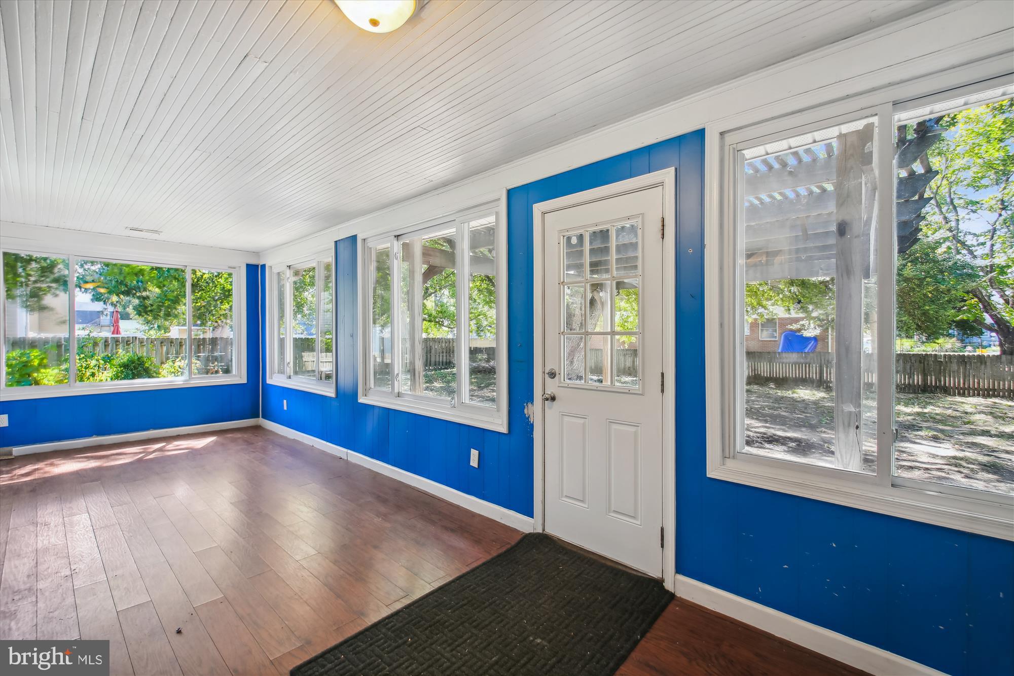 611 Clark Avenue Deale, MD 20751 - Photo 28 of 37 a view of an empty room with wooden floor and a window
